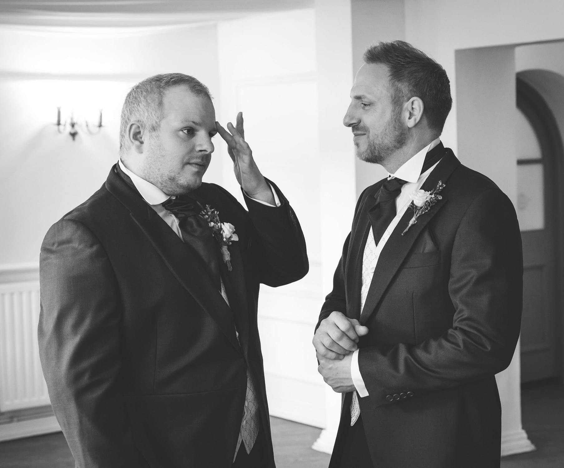 groom and best man waiting for bride