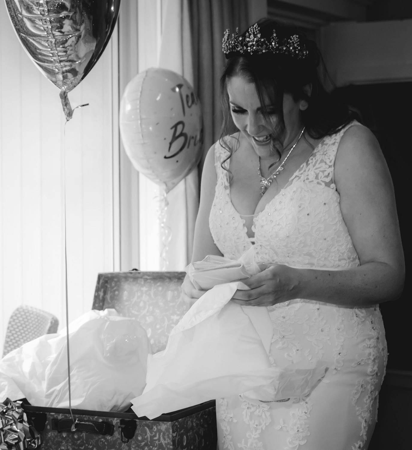 bride opening gifts