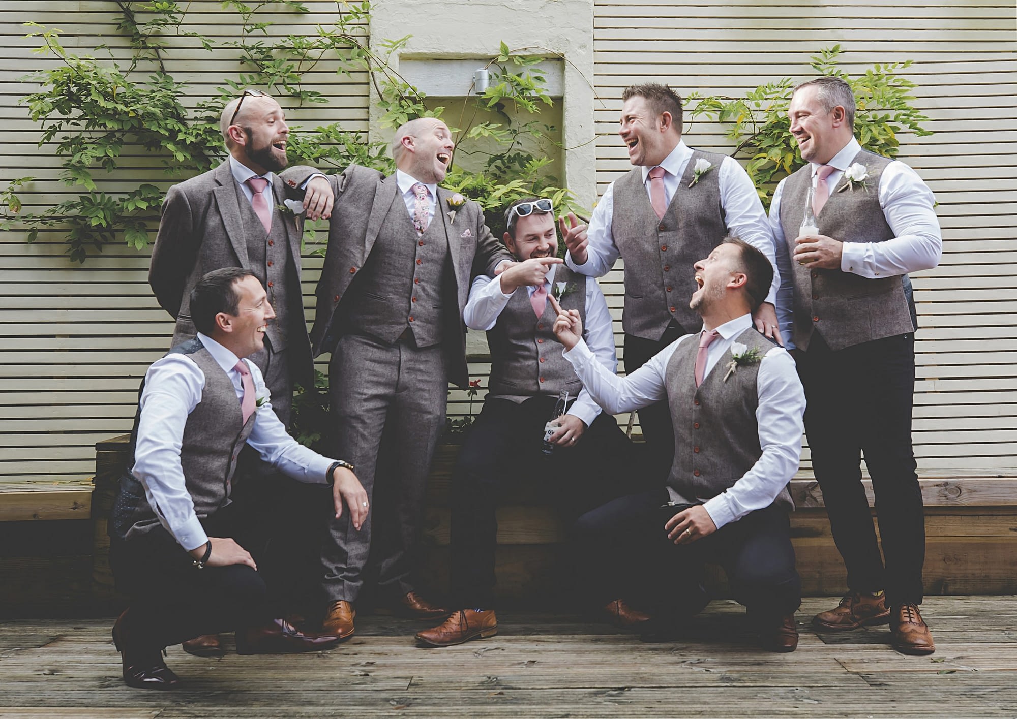 groomsman laughing together